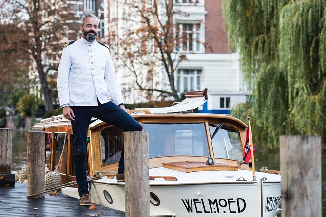 Private Guided Historic Amsterdam Canal Cruise in a Salon Boat - What the guide adds to the ride