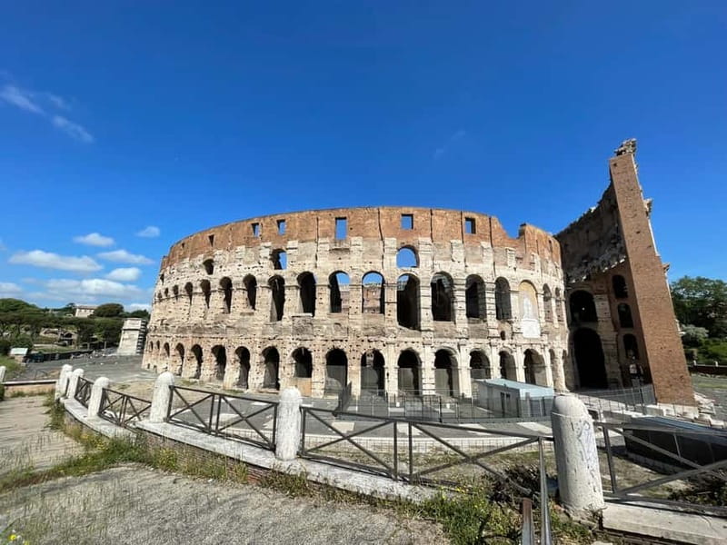 Rome: Colosseum and Ancient Rome Small Group Guided Tour - Walking toward the Roman Forum