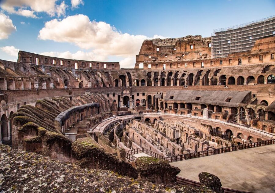 Rome: Colosseum Arena Access and Ancient Rome Guided Tour - Walking through the Roman Forum