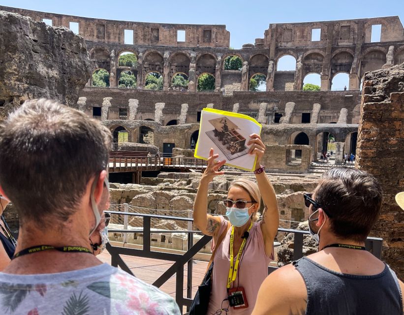 Rome: Colosseum, Roman Forum & Palatine Hill Guided Tour - Entering the Colosseum and reaching the Arena floor
