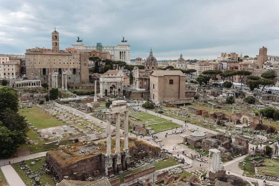 Rome: Colosseum, Vatican Museums & Historic Center in a Day - Entering the Colosseum with an official operator