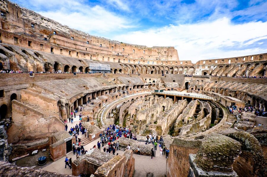 Rome: Private Colosseum Experience and Ancient Ruins Tour - Walking through the Roman Forum
