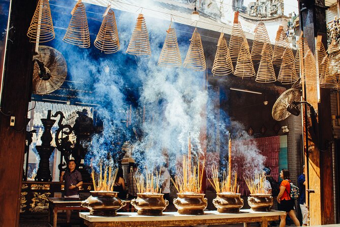 Saigon Unseen, History, & Hidden Gems Sightseeing Motorbike Tour - District 5 Chinatown and an ancient temple