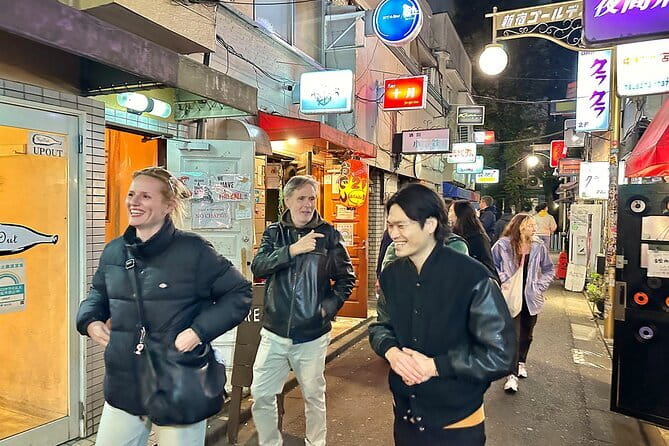 Tokyo: Shinjuku Historical Walking Tour & Secret Backstreets - Kabukicho Tower shows modern Tokyo